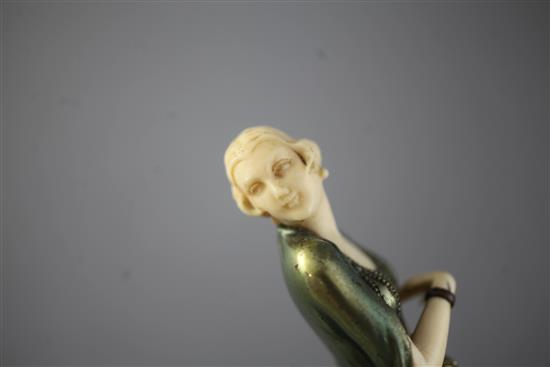 An Art Deco cold painted bronze and ivory figure of a Society lady, height 8.5in.